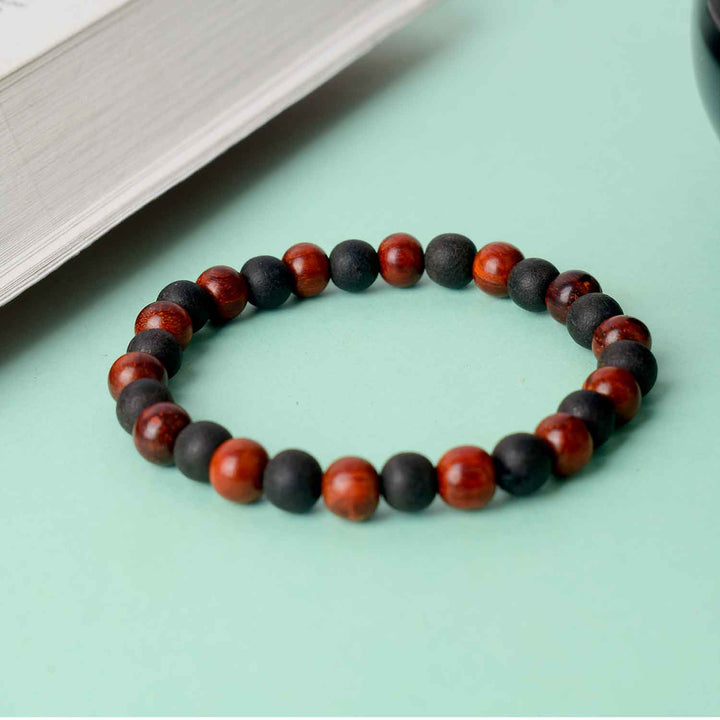 8mm Red and Ebony Bracelet – handcrafted bracelet featuring alternating red sandalwood and ebony beads for a bold and balanced spiritual look. India’s Largest Pooja Accessories Brand - www.satvikworldcom