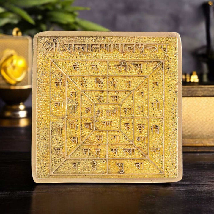 Asht Dhatu Shree Santan Gopal Yantra engraved with divine child-form Krishna symbols, used for fertility, safe pregnancy, and blessings of healthy children. India’s Largest Pooja Accessories Brand - www.satvikworld.com