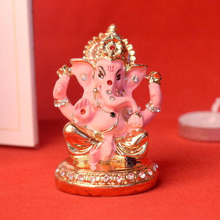 Beautiful Pink Ganesh Idol, intricately designed to bring prosperity, peace, and divine blessings to your space or car. India’s Largest Pooja Accessories Brand – www.satvikworld.com