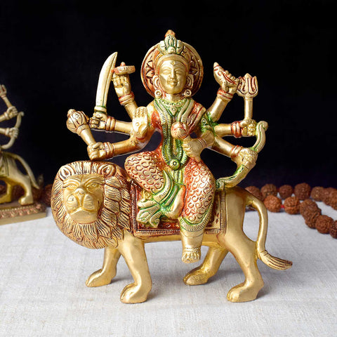 5.5-inch brass Durga idol seated on a lion, symbolizing power and divine protection, ideal for Navratri puja and spiritual celebrations. Perfect for pooja rooms and festive decor. India’s Largest Pooja Accessories Brand – www.satvikworld.com