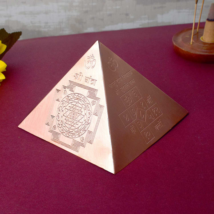 Small Copper Pyramid with precise Vastu geometry, designed for energy balancing, vastu correction, spiritual protection, and amplifying positivity in any environment. India’s Largest Pooja Accessories Brand - www.satvikworld.com