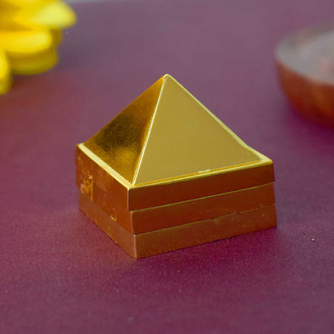 Brass Vastu Pyramid (Vastu Devta Yantra) featuring 45 deity zones, designed to balance energy flow, correct Vastu dosh, and bring prosperity and peace to any space.
India’s Largest Pooja Accessories Brand - www.satvikworld.com