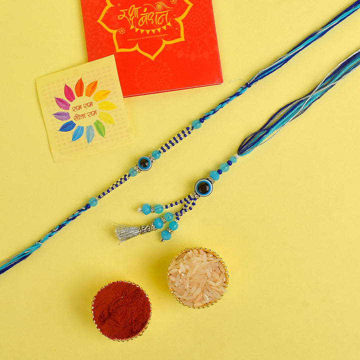 Designer Couple Rakhi Set for Bhaiya and Bhabhi with Roli Chawal and Ram Sita Stickers – Raksha Bandhan Gift Combo. India’s Largest Brass Idols Brand - www.satvikworld.com