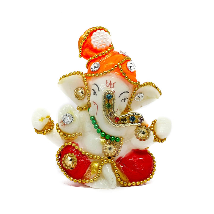 Decorative Ganesh Idol, showcasing intricate craftsmanship, is perfect for enhancing spiritual ambiance and adding prosperity to your home. India’s Largest Pooja Accessories Brand – www.satvikworld.com