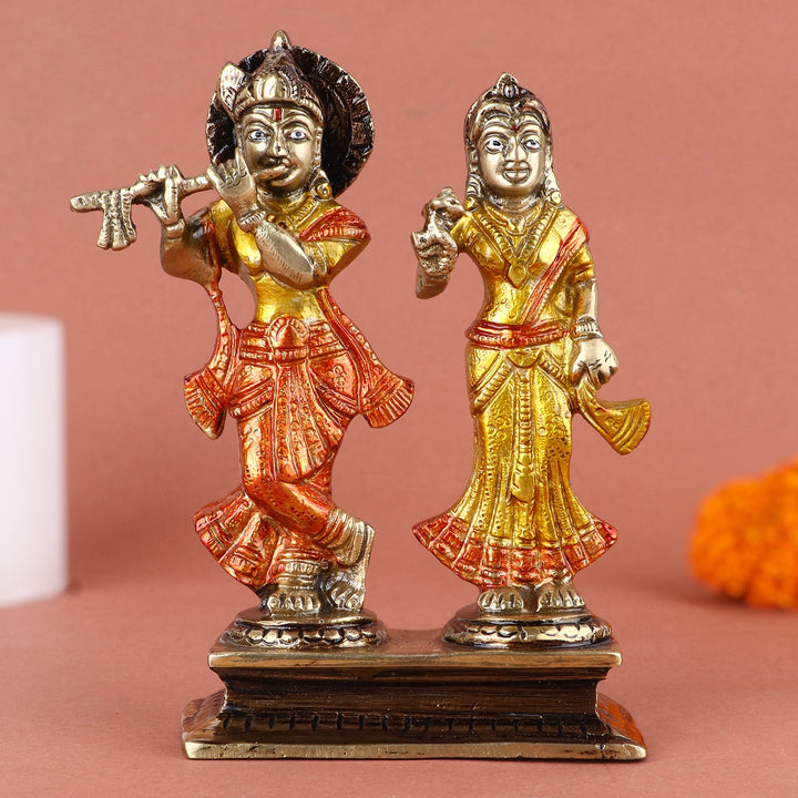Gorgeous Radha Rani and Krishna Kanhaiya Colorful Brass Idol – Beautifully Crafted Lord Krishna and Radha Statue in Vibrant Brass, Perfect for Temple, Home Decor, and Spiritual Worship, Intricate Detailing with Colorful Accents, Indian God Statues for Puja, Radha Krishna Idol for Mandir Decoration, Buy Colorful Brass God Statues Online, Affordable Prices for Divine Idols | India’s Largest Pooja Accessories Brand – www.satvikworld.com