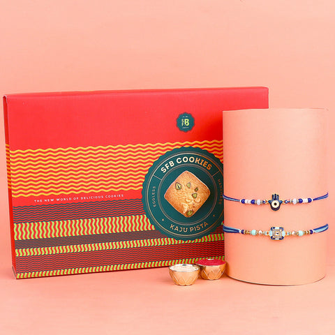 Image of a beautifully designed Rakhi with sweets, the perfect combination of tradition and sweetness for Raksha Bandhan celebration. Shop now at SatvikStore.in. #Rakhi #RakhiOnline #SendRakhi #DesignerRakhi #BeautifulRakhi #LatestRakhi #NewRakhi #ModernRakhi"