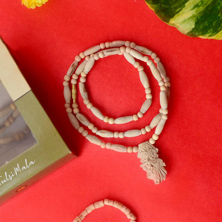 100% Original Charming Tulsi Mala with Radha Krishna Locket, made from sacred Tulsi wood beads, ideal for spiritual practice, meditation, and mantra chanting. India’s Premium Jap Mala Store- www.satvikworld.com