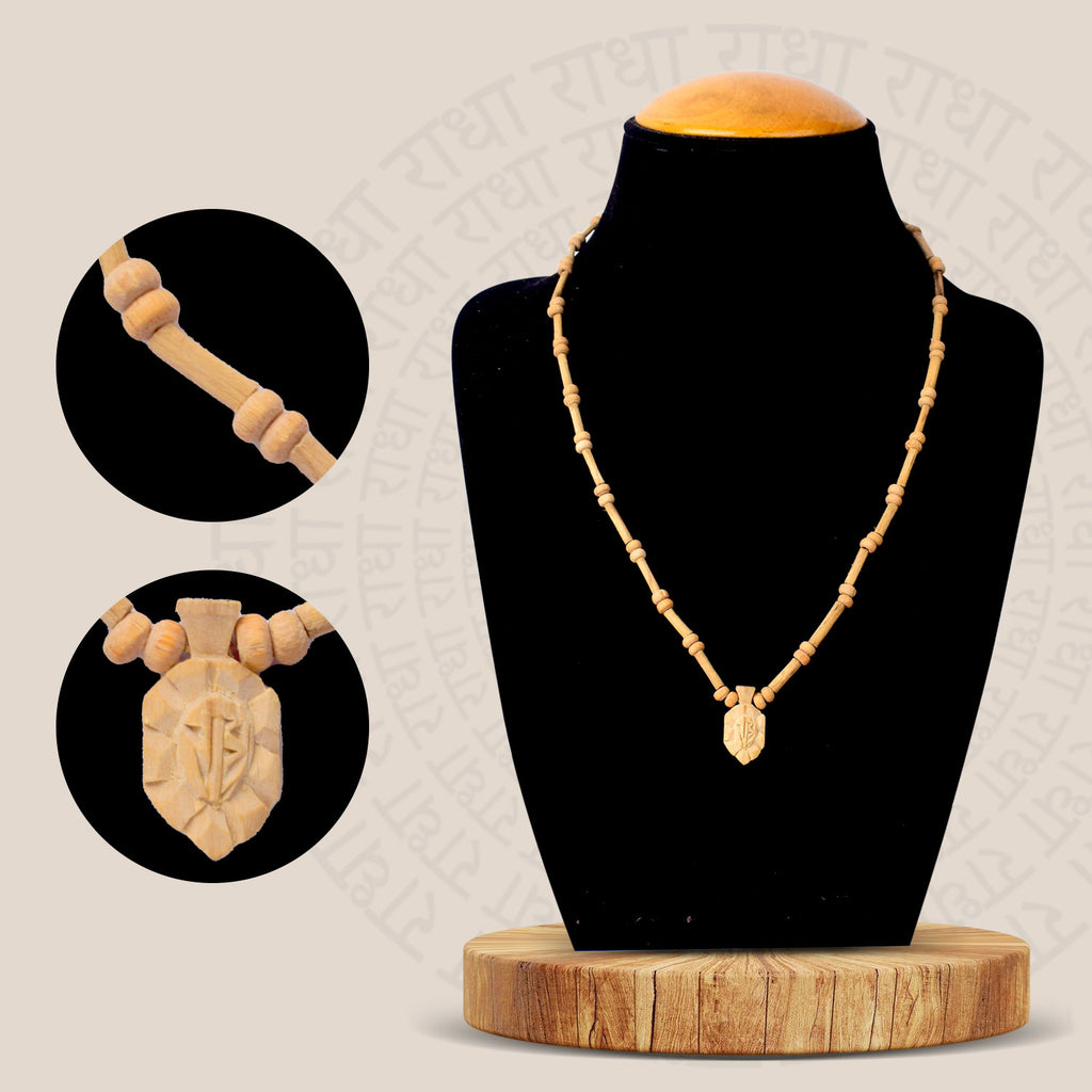 100% Original Tulsi Flat Mala with Radha Pendent, featuring 108+1 sacred beads, designed to enhance spiritual well-being and devotion. Ideal for meditation, prayer, and religious rituals. Crafted with care for a lasting connection to divinity. India’s Largest Pooja Accessories Brand – www.satvikworld.com