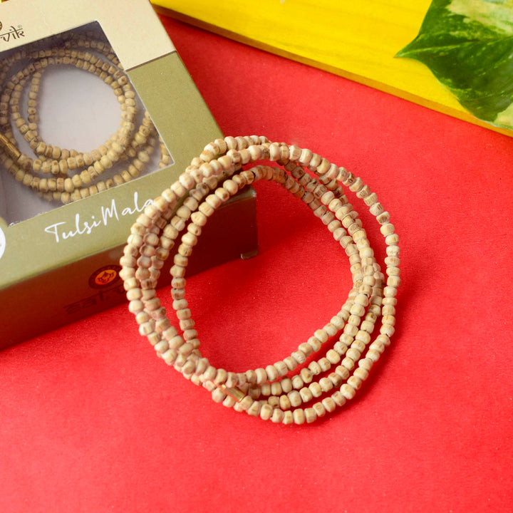 100% Original Tulsi Mala with small beads, featuring 108+1 authentic beads, perfect for meditation, prayer, and spiritual rituals. Made from pure Tulsi wood, this mala brings peace and devotion. India’s Largest Pooja Accessories Brand – www.satvikworld.com
