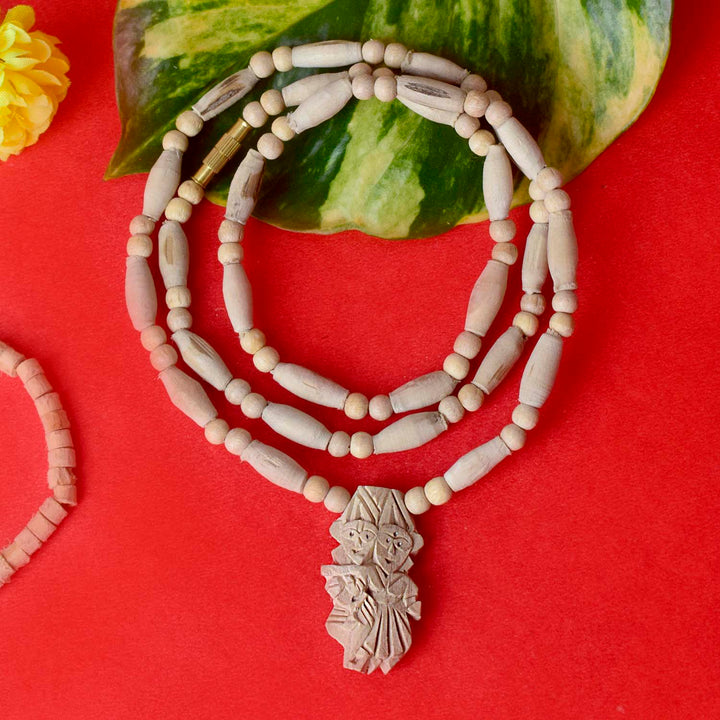 100% Original Tulsi Mala with Radha Krishna Locket, crafted with pure Tulsi beads for a divine spiritual experience. Perfect for prayer and meditation, this mala brings harmony and blessings. India’s Largest Pooja Accessories Brand – www.satvikworld.com