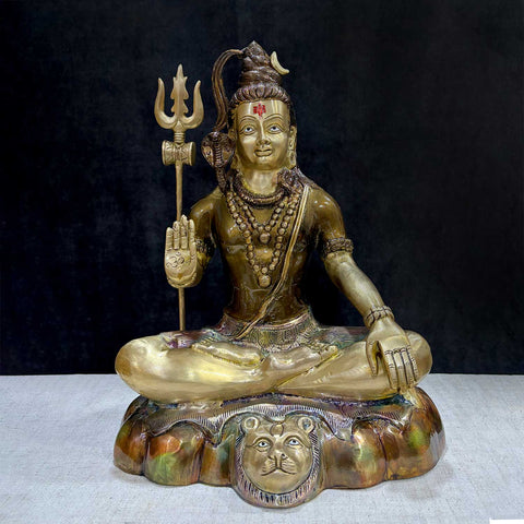 A 17-inch handcrafted Brass Shiva Idol in a meditative posture, radiating peace and tranquility, perfect for enhancing the spiritual atmosphere of your home or temple. Ideal for meditation spaces and devotion. India’s Largest Pooja Accessories Brand – www.satvikworld.com