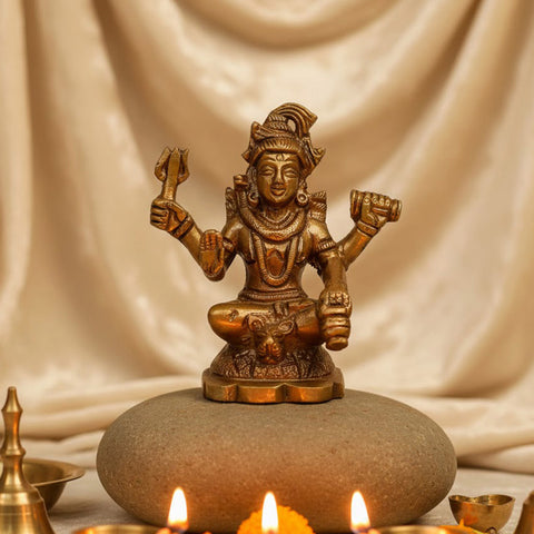 Brass Chaturbhuj Shiva Ji idol, depicting Lord Shiva with four arms, intricately crafted with divine details, symbolizing power, protection, and spiritual transcendence. Ideal for worship or spiritual décor. India’s Largest Pooja Accessories Brand – www.satvikworld.com
