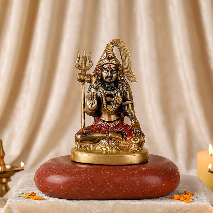 Brass Shiv idol, intricately crafted to represent Lord Shiva, symbolizing divine energy, strength, and protection. Ideal for pooja rooms and spiritual spaces. India’s Largest Pooja Accessories Brand – www.satvikworld.com