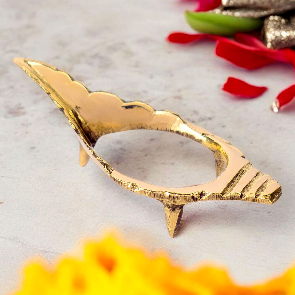 4.75 inch finely crafted brass Shankh stand with elegant detailing, ideal for holding medium-sized conch shells during pooja and spiritual ceremonies. India’s Largest Pooja Accessories Brand – www.satvikworld.com
