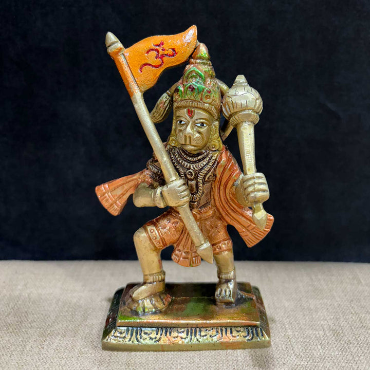 4.9-inch sacred brass Hanuman statue, depicting Lord Hanuman in a powerful and dynamic posture, symbolizing strength, devotion, and protection. Ideal for spiritual décor or puja rituals. India’s Largest Pooja Accessories Brand – www.satvikworld.com