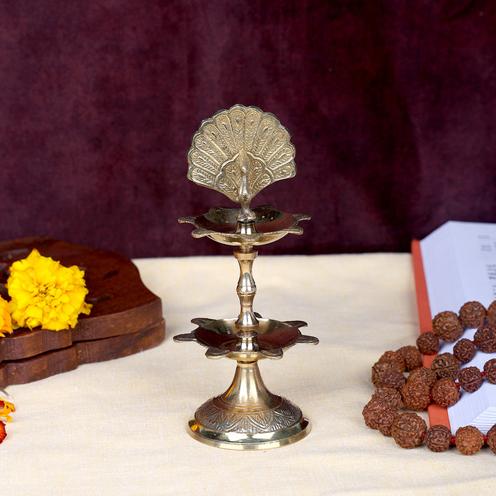 6.1 inch brass flying peacock 2 step Kerala Samai Deepam diya for pooja and temple use. India’s Largest Pooja Accessories Brand – www.satvikworld.com