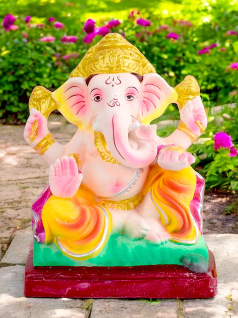 6.7-inch eco-friendly Ganesha idol seated in Padmasana pose, handcrafted from natural clay with serene facial expression and detailed finish for sustainable celebrations. India’s Largest Pooja Accessories Brand – www.satvikworld.com