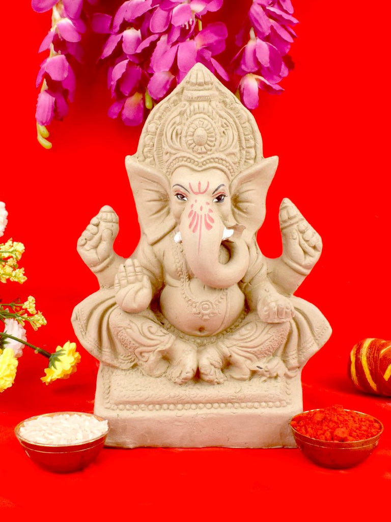 8 Inch plain Yadhvasin eco-friendly Ganesha idol in Gajanan pose, crafted from natural clay with minimal detailing for an elegant traditional look. India’s Largest Pooja Accessories Brand – www.satvikworld.com