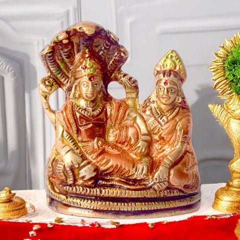 Sacred small brass Vishnu Laxmi statue, beautifully crafted to depict Lord Vishnu and Goddess Laxmi, symbolizing wealth, prosperity, and divine blessings. Perfect for worship, gifting, or home décor. India’s Largest Pooja Accessories Brand – www.satvikworld.com