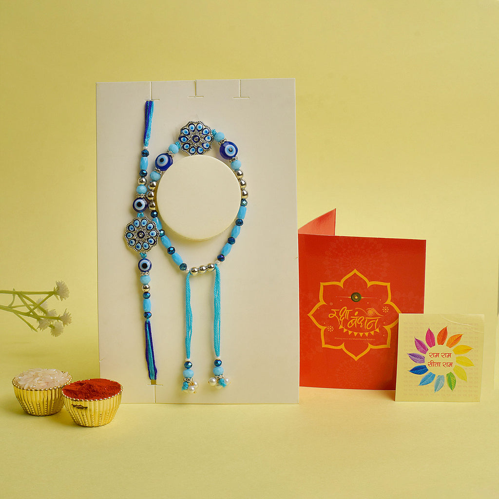 Designer Couple Rakhi Set for Bhaiya and Bhabhi with Roli Chawal and Ram Sita Stickers – Raksha Bandhan Gift Combo. India’s Largest Brass Idols Brand - www.satvikworld.com