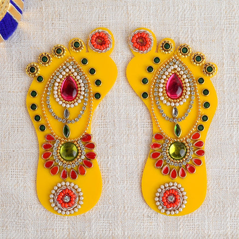 Beautiful Laxmi Charan sticker featuring golden footprints symbolizing the arrival of Goddess Lakshmi and inviting prosperity into the home. India’s Largest Pooja Accessories Brand – www.satvikworld.com