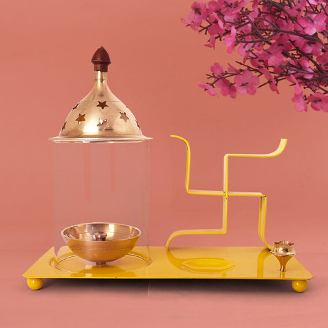 Brass and metal Swastik Chimney Diya Tray with an incense holder in yellow, beautifully crafted for spiritual rituals and pooja ceremonies, featuring a traditional Swastik design and a functional incense holder. India’s Largest Pooja Accessories Brand – www.satvikworld.com