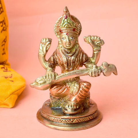 3.7-inch elegant brass statue of Goddess Saraswati, intricately crafted with fine details, depicting the goddess of wisdom, music, and arts. Ideal for spiritual décor or to inspire knowledge and creativity. India’s Largest Pooja Accessories Brand – www.satvikworld.com