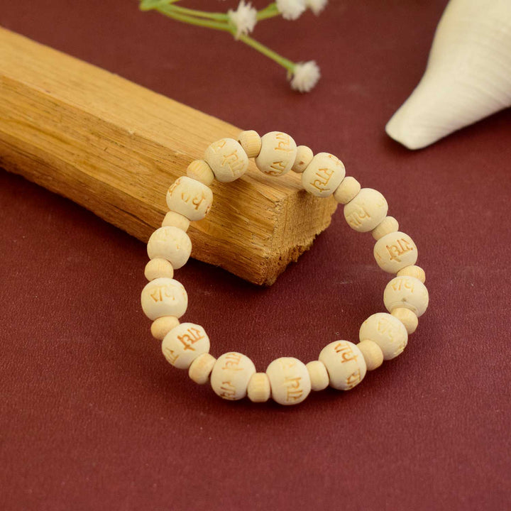 Wooden Radhe Bracelet with natural beads and Radhe nameplate – devotional wrist accessory for Radha Krishna bhakti and spiritual connection. India’s Largest Brass Idols Brand - www.satvikworld.com

