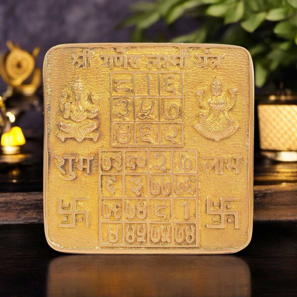 Brass Shree Ganesh Laxmi Yantra intricately engraved with symbols of prosperity and obstacle removal—ideal for wealth attraction, business success, and spiritual balance. India’s Largest Pooja Accessories Brand - www.satvikworld.com


