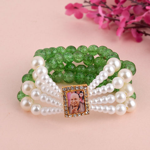 Crystal Green Beads Four Layer & White Pearl Bracelet with Jai Guruji Swaroop