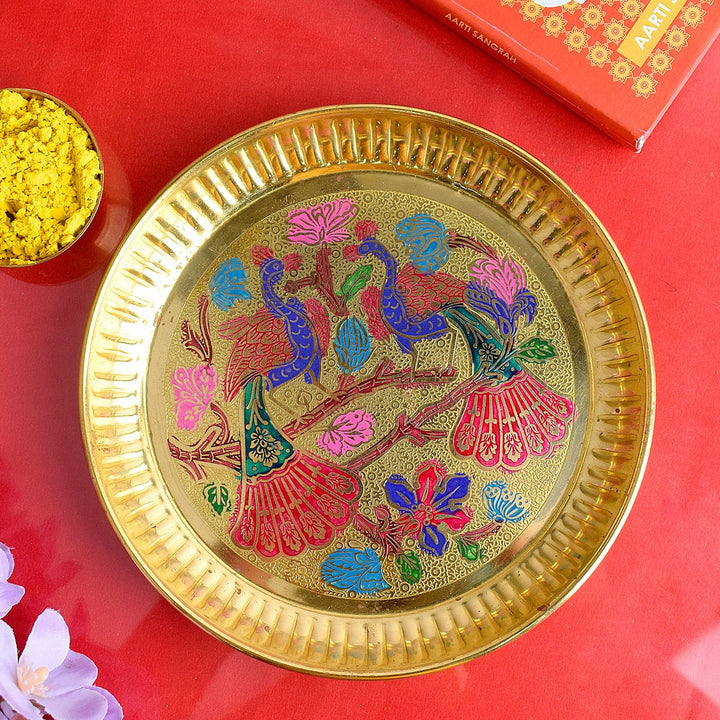 Shop elegant Decorative Brass Peacock Thali with intricate design, ideal for pooja rituals, festive décor, and spiritual gifting. A perfect addition to your temple or home mandir | Satvikworld.com