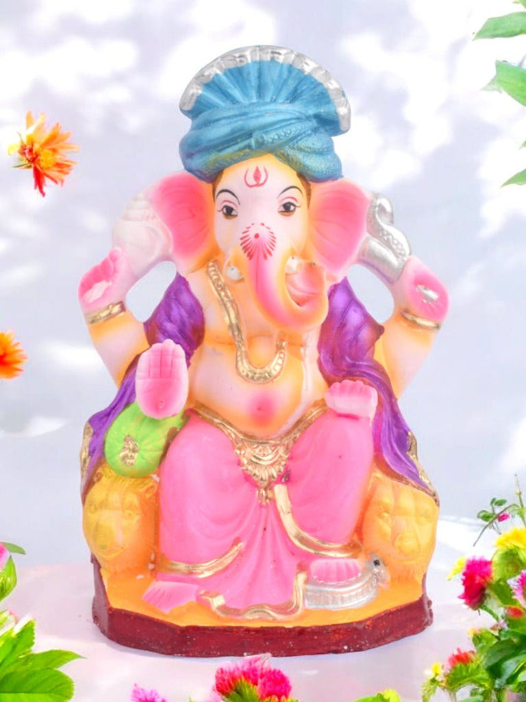 Eco-friendly 10 Inch Ganesha idol in royal Raja sitting pose, made from natural Shadu clay with fine craftsmanship. India’s Largest Pooja Accessories Brand – www.satvikworld.com