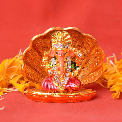 Ganesh Sea Shell Design Idol – An exquisite idol of Lord Ganesha crafted in a unique sea shell design, symbolizing divine protection, prosperity, and good fortune. India’s Largest Pooja Accessories Brand – www.satvikworld.com