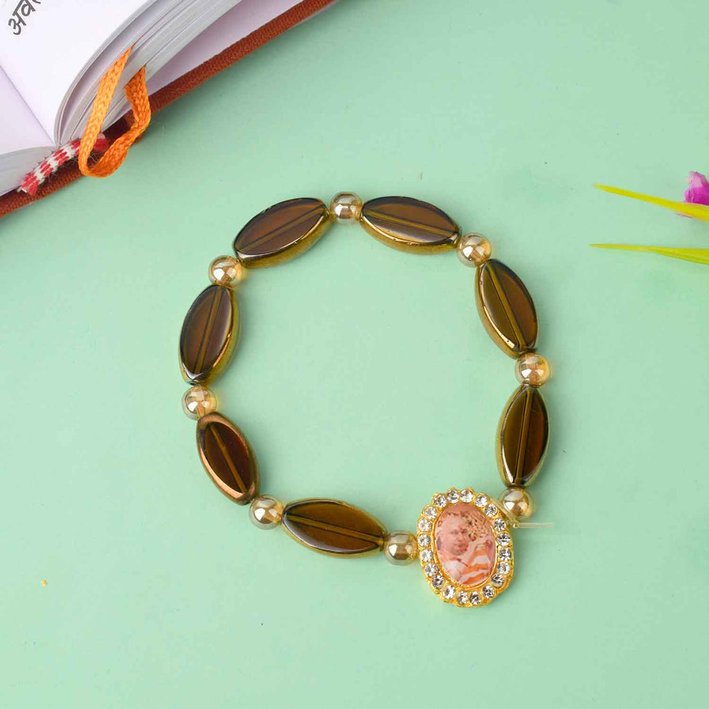 Guruji Swaroop Bracelet with translucent oval shaped beads in brown and black – ideal for spiritual daily wear and gifting. India’s Largest Pooja Accessories Brand – www.satvikworld.com