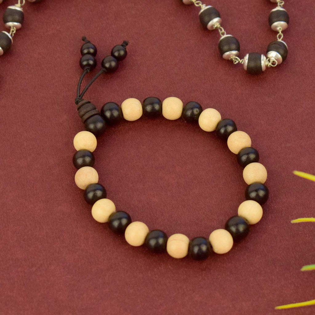 Handcrafted Karungali (Ebony) and Sandalwood Beads Bracelet designed for spiritual protection, peace of mind, and balancing inner energy. Ideal for daily wear and meditation practices. India’s Largest Pooja Accessories Brand - www.satvikworld.com