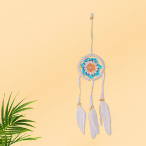 Handcrafted round-shaped dream catcher wall hanging with soft feather charms, ideal for bedroom or meditation space decor. India’s Largest Pooja Accessories Brand – www.satvikworld.com