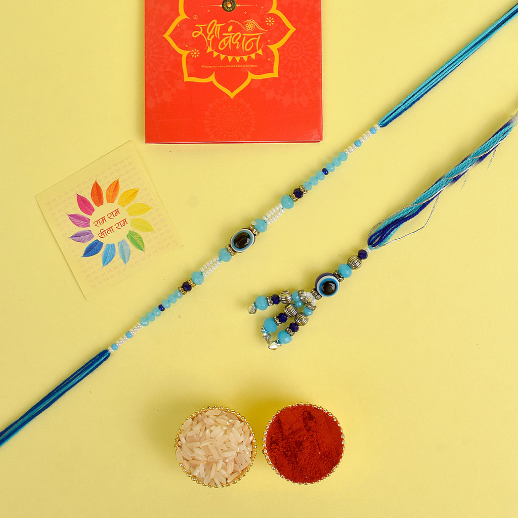 Designer Couple Rakhi Set for Bhaiya and Bhabhi with Roli Chawal and Ram Sita Stickers – Raksha Bandhan Gift Combo. India’s Largest Brass Idols Brand - www.satvikworld.com