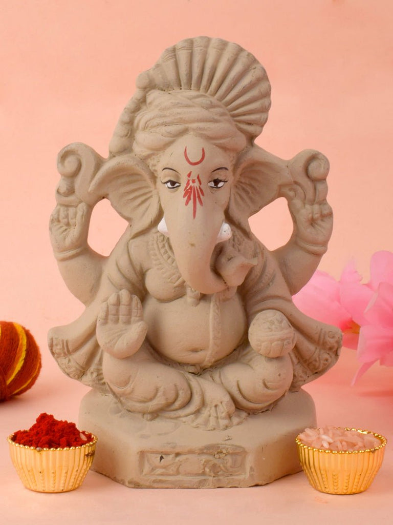 6.3 Inch Jaswand-themed eco-friendly Ganesha idol adorned with floral elements, seated gracefully in a serene posture. India’s Largest Pooja Accessories Brand – www.satvikworld.com
