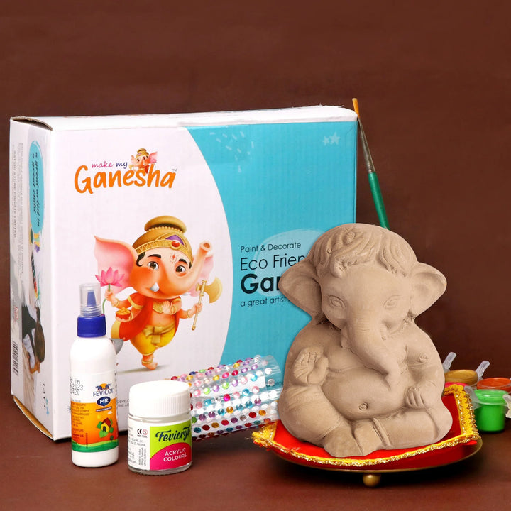Make My Ganesha DIY Kit for Kids with eco-friendly clay Ganesha idol, paint set, brushes, and decoration materials for Ganesh Chaturthi crafting fun. India’s Largest Pooja Accessories Brand – www.satvikworld.com