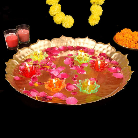 Metal lotus-shaped urli bowl for decor, paired with a beautiful floating diya, ideal for festive and traditional ambiance. India’s Largest Pooja Accessories Brand – www.satvikworld.com