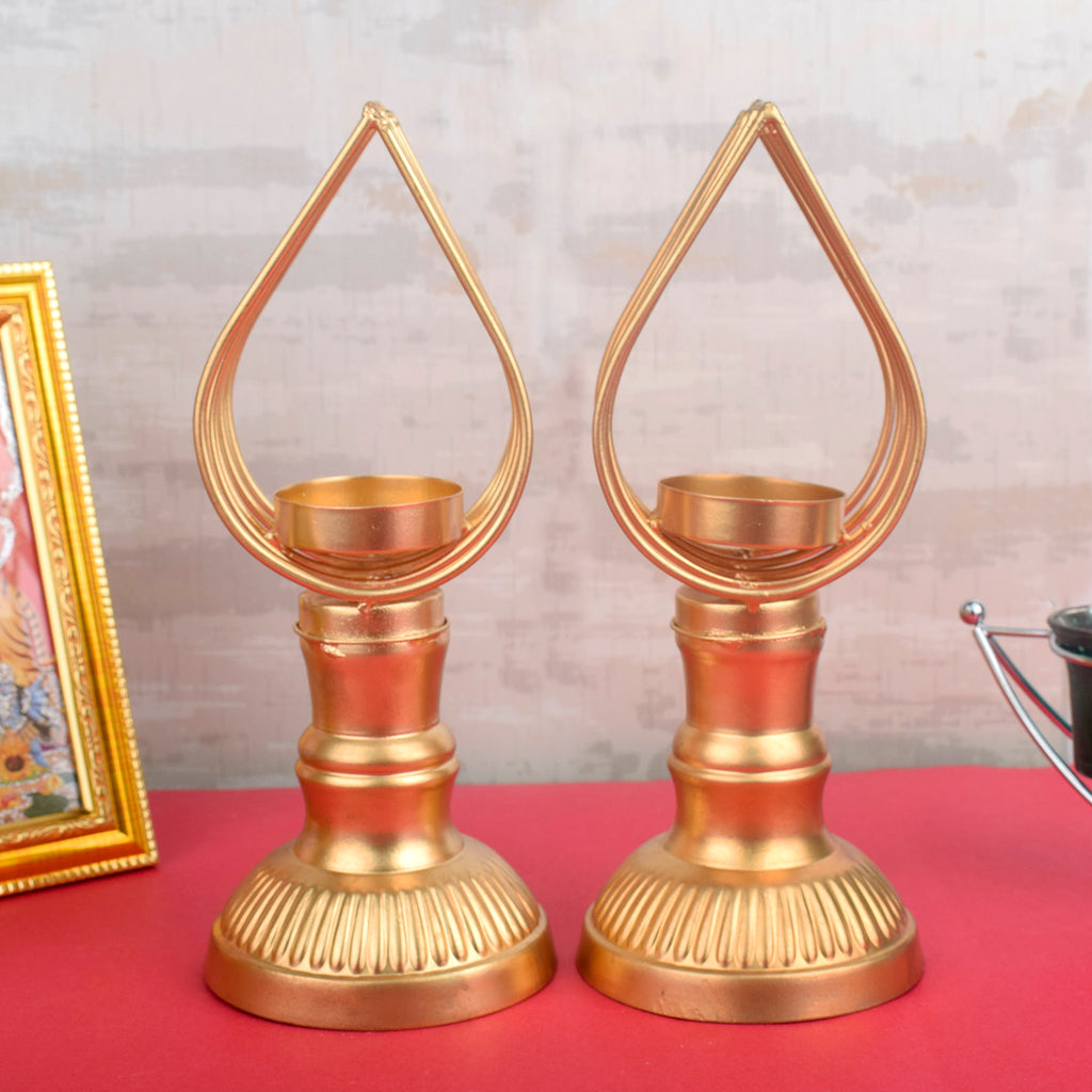 Pair of luminous tealight holders with intricate cutwork design, perfect for festive, romantic, or ambient home lighting décor. India’s Largest Pooja Accessories Brand – www.satvikworld.com