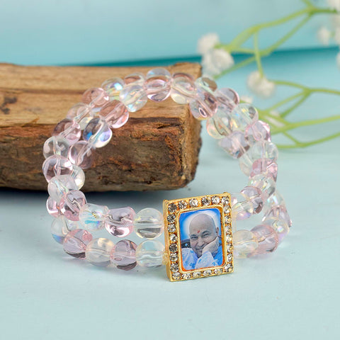 Pink & Clear Shiny Beads Double Layer Guruji Swaroop Bracelet featuring delicate pink and luminous clear beads with Jai Guruji Swaroop – perfect for spiritual wear, festive gifting, and daily devotion. India’s Largest Pooja Accessories Brand – www.satvikworld.com