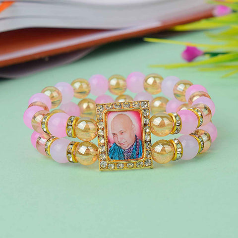 Radiant Guruji Swaroop Bracelet with golden and assorted colored beads – handcrafted spiritual bracelet for gifting and daily wear – www.satvikworld.com