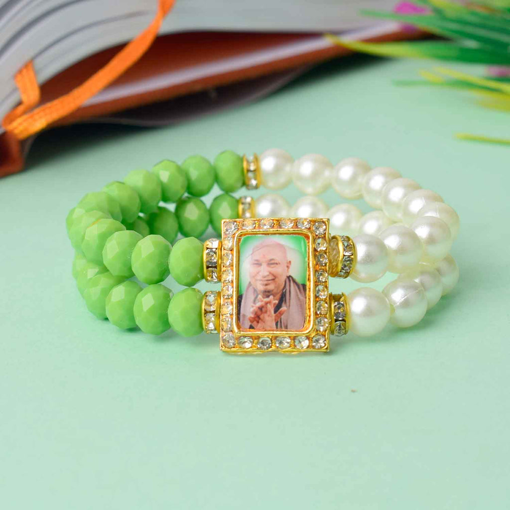 Serene Guruji Swaroop Bracelet featuring white pearls and assorted colored beads – perfect for daily wear, spiritual occasions, and gifting. India’s Largest Pooja Accessories Brand – www.satvikworld.com