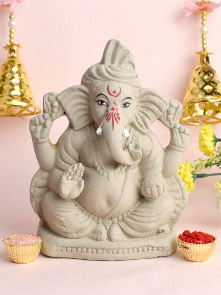7 Inch eco-friendly Lord Ganesha idol seated with both legs folded in a calm meditative posture, made from natural clay with elegant detailing. India’s Largest Pooja Accessories Brand – www.satvikworld.com