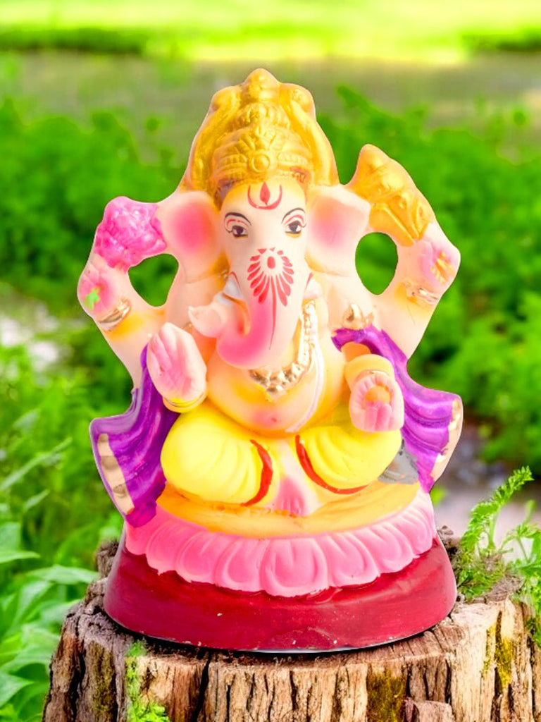 6.5-inch eco-friendly Shayana Ganesha idol featuring a vibrant purple patka, beautifully sculpted in a reclining posture for eco-conscious home and festive décor. India’s Largest Pooja Accessories Brand – www.satvikworld.com