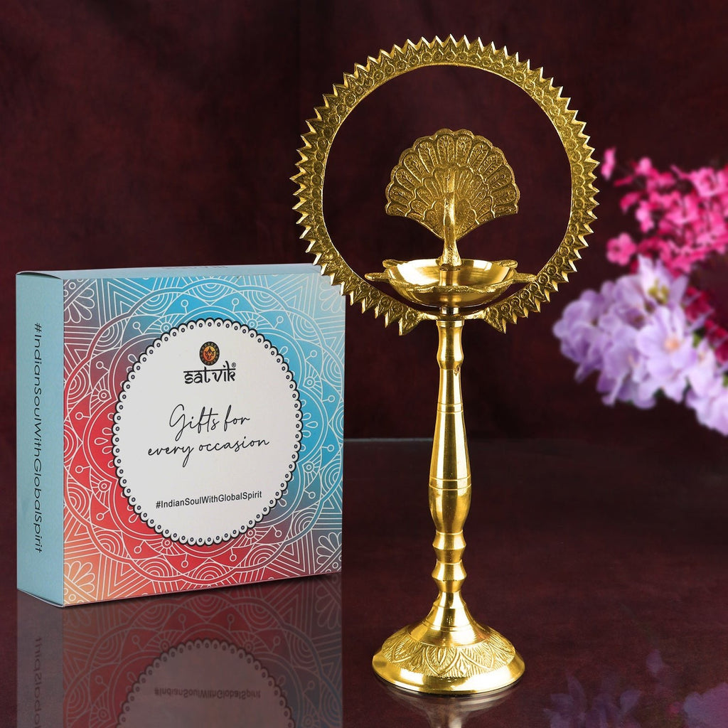 12 INCH Brass Mor Kiran Style Kerala Diya – Elegant brass diya with a Mor Kiran design, perfect for pooja rituals and spiritual occasions. India’s Largest Pooja Accessories Brand – www.satvikstore.in