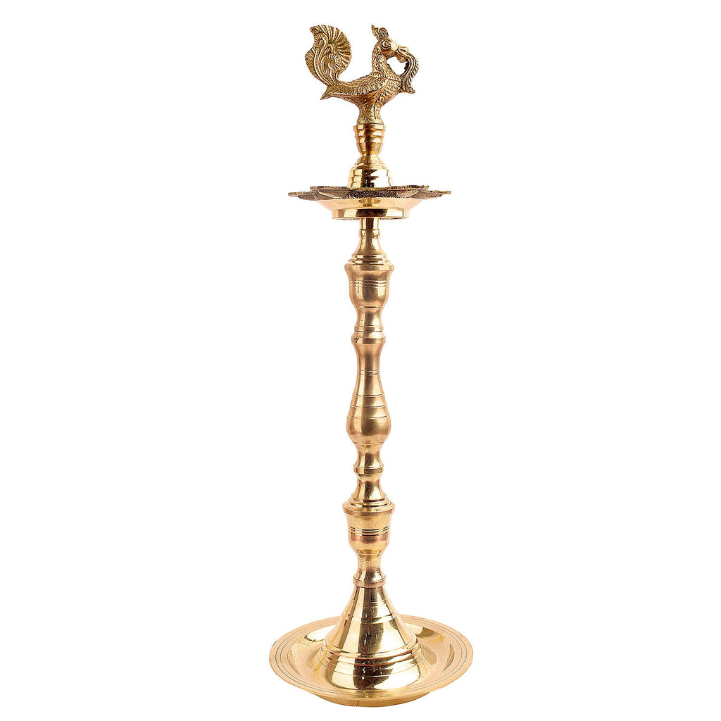 17 Inch Brass Peacock Kerala Diya – Grand brass diya with intricately designed peacock motif, perfect for pooja ceremonies, spiritual rituals, and home decor. India’s Largest Pooja Accessories Brand – www.satvikstore.in