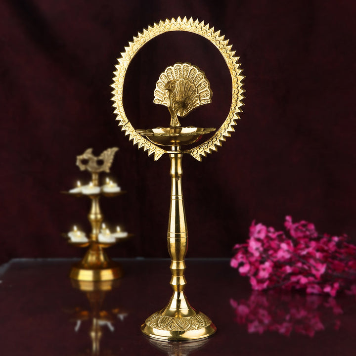17 Inch Mor Kiran Style Brass Kerala Diya – Exquisite handcrafted brass diya in the traditional Mor Kiran style, perfect for Kerala-style pooja rituals and festive decorations. India’s Largest Pooja Accessories Brand – www.satvikstore.in