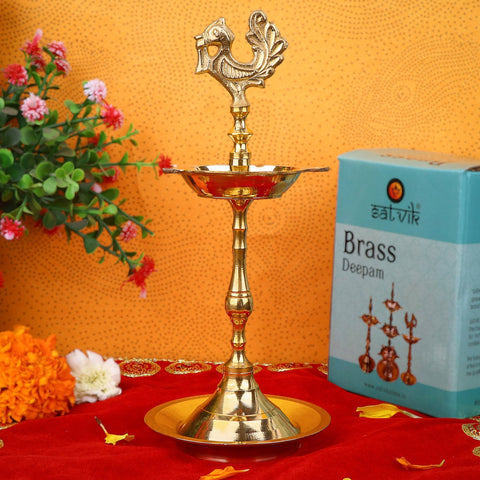 8 Inch Brass Peacock Kerala Diya – Elegant brass diya featuring a peacock design, perfect for pooja ceremonies, spiritual rituals, and home decor. India’s Largest Pooja Accessories Brand – www.satvikstore.in